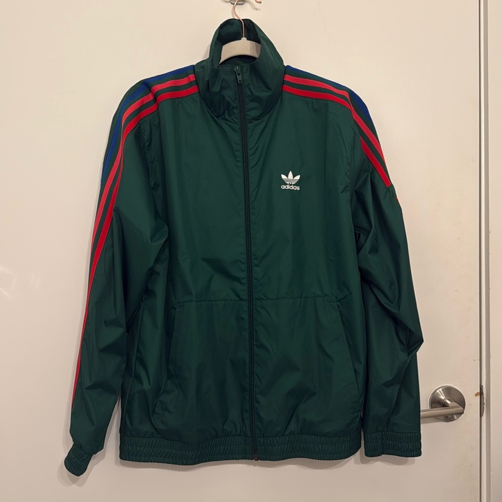 Rare unisex Adidas Track suit with red, blue and green stripes